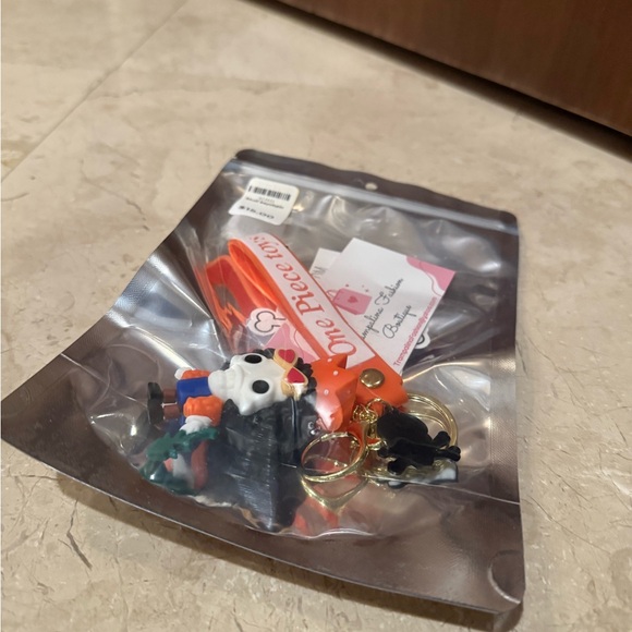 Skull Keychain with Orange and Blue Accents - Picture 5 of 5